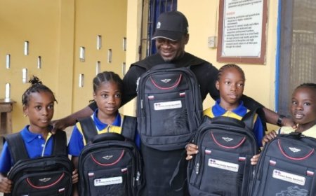 Smiles Beam on The Faces of Police Children As Pelican Valley Fulfils Pledge, Donates School Bags To Pupils