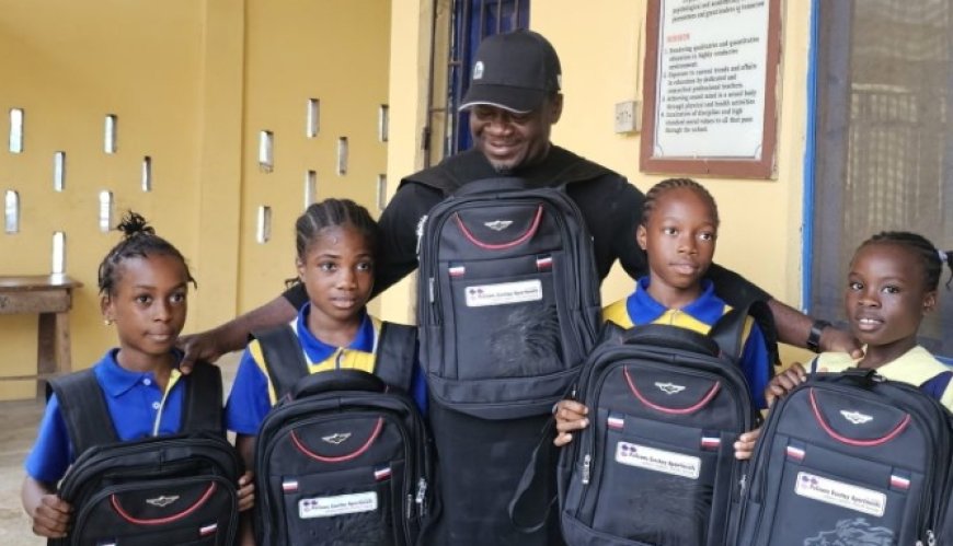 Smiles Beam on The Faces of Police Children As Pelican Valley Fulfils Pledge, Donates School Bags To Pupils